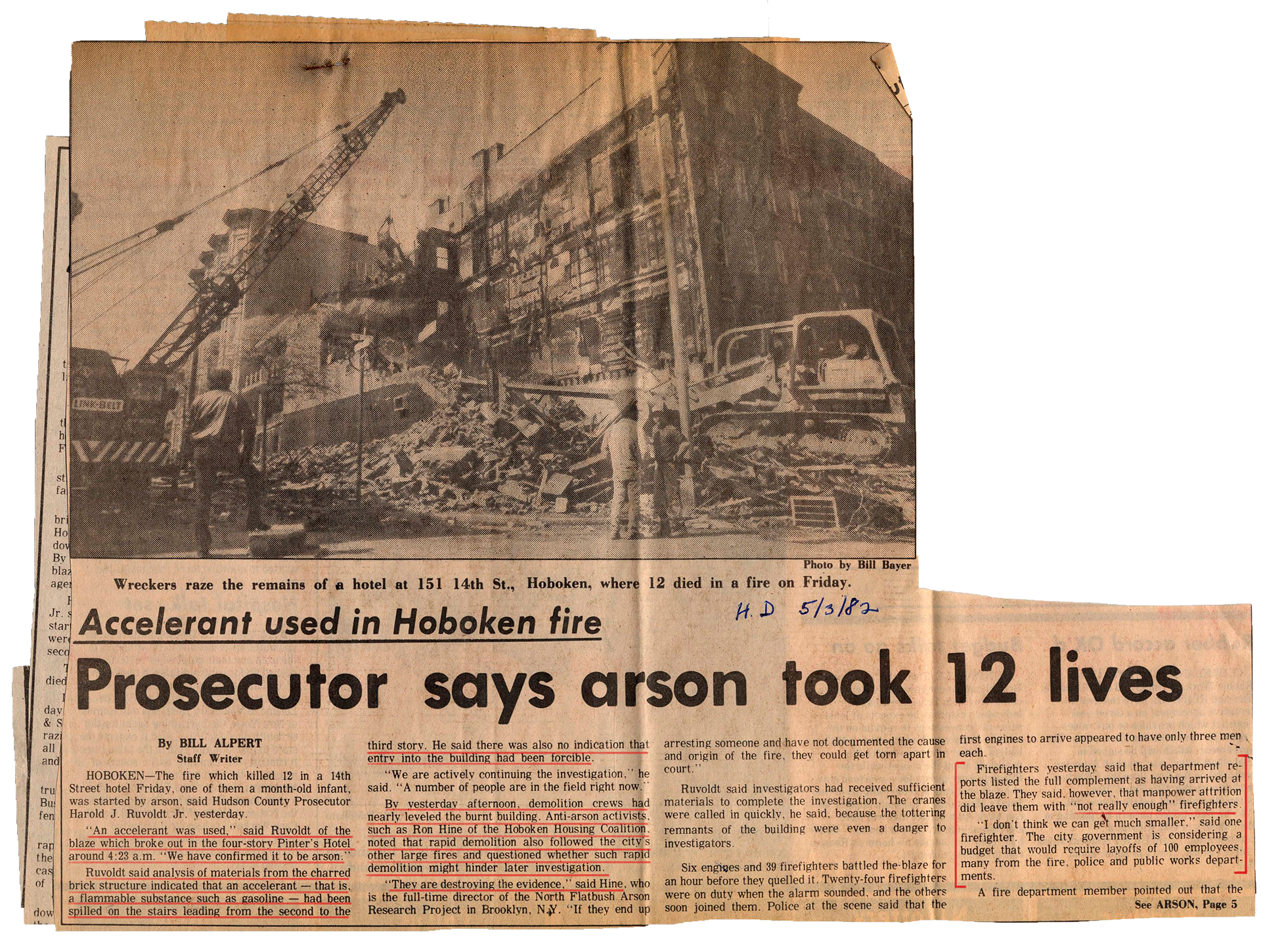 Newspaper clipping titled "Prosecutor says arson took 12 lives".