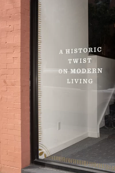 Image of window that says: A Historic Twist on Modern Living.