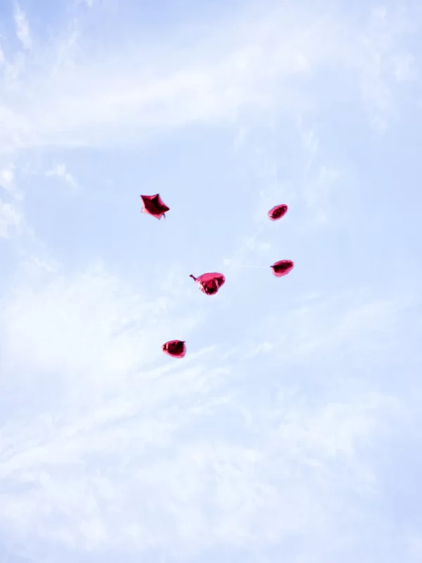Balloons in the sky.